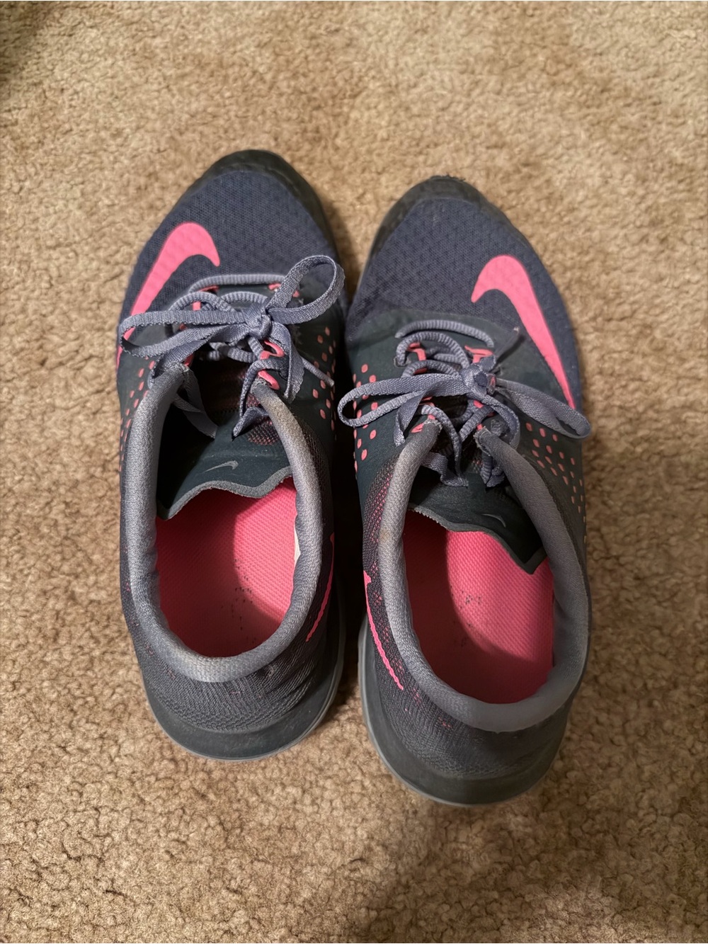 Nike Women's Gray Athletic Shoes with Pink Swoosh